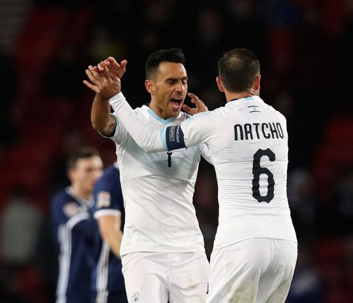 GLASGOW, SCOTLAND - NOVEMBER 20:  Eran Zahavi of Israel celebrates with team mate Bibras Natcho after scoring his team's second goal during the UEFA Nations League C group one match between Scotland and Israel at Hampden Park on November 20, 2018 in Glasgow, United Kingdom.  (Photo by Ian MacNicol/Getty Images)